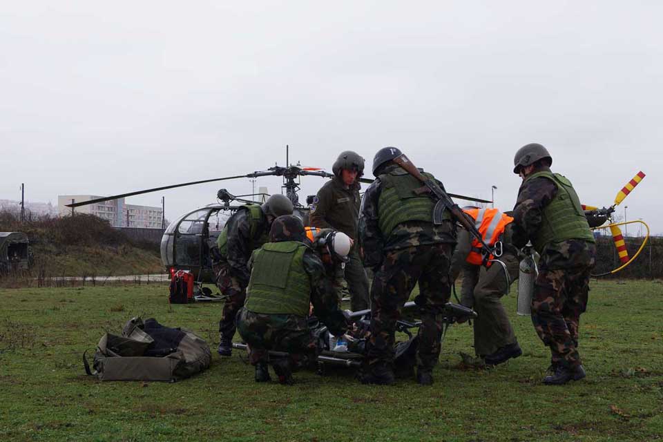 A wounded person is prepared for the air transport